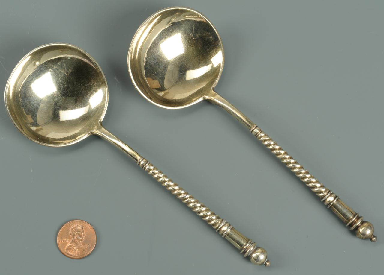 Lot 93: Pair Russian Engraved Silver Cream Spoons