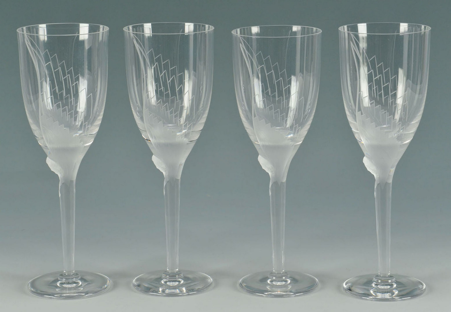 Lot 198: 4 Lalique Ange Champagne Flutes