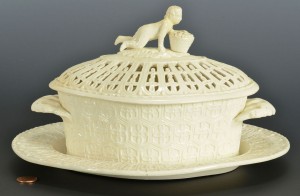 Lot 247: Creamware covered basket with figural knob