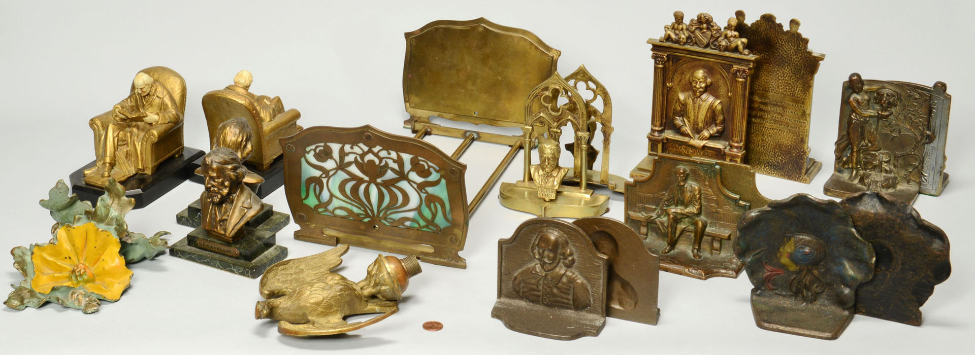 Lot 275: Group of 11 Pairs of Bookends, mostly bronze