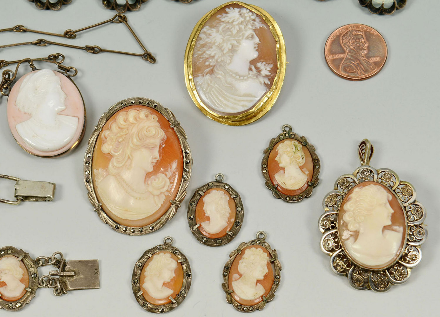 Lot 291: 16 items cameo, moonstone, and mother of pearl jew | Case Auctions