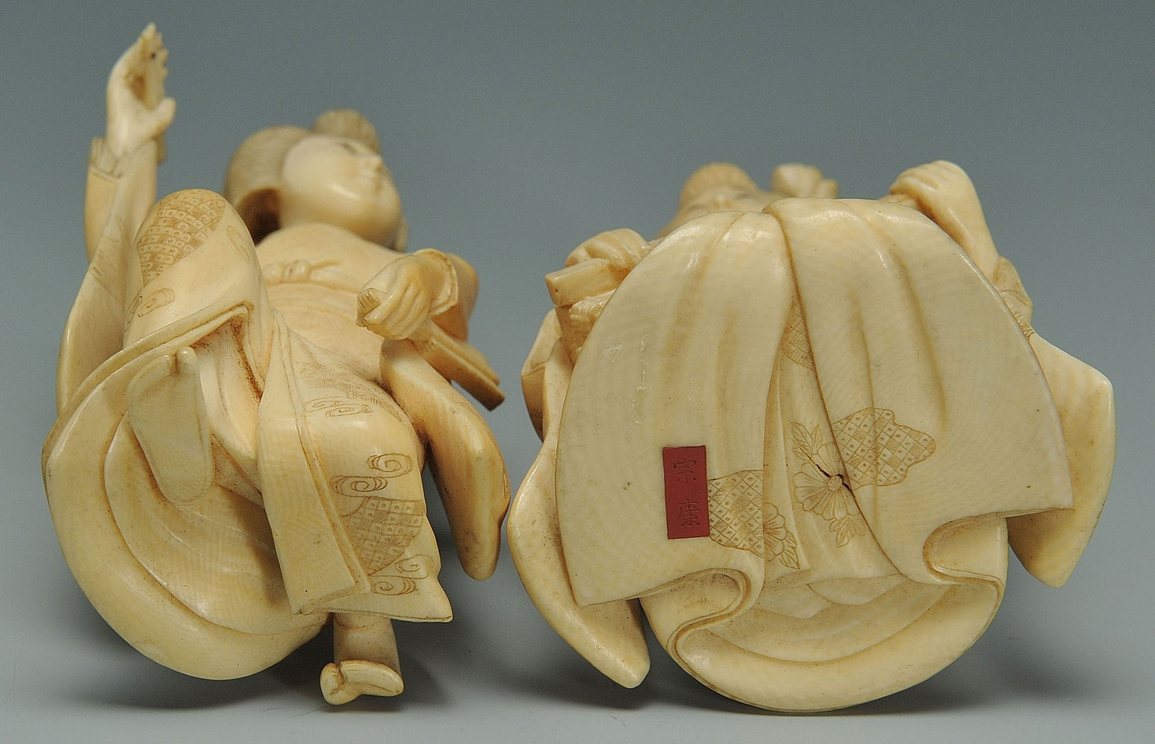 Lot 448: Two Japanese Carved ivory Female Figures