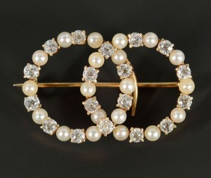Lot 498: 14k Double Circle Diamond & Pearl Pin
