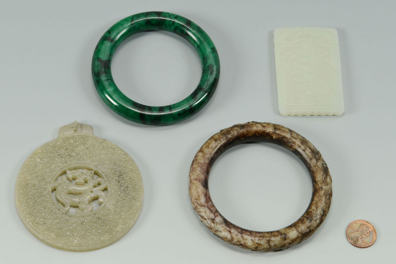 Lot 9: 4 Chinese Jade Jewelry items