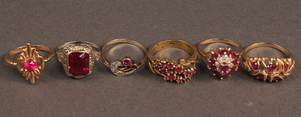 Lot 254: Lot of 6 Gold Rings w/ Red Stones
