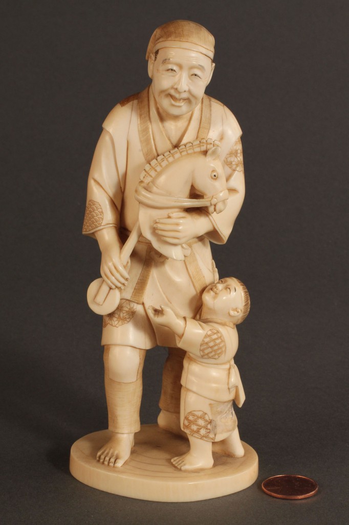 Lot 265: Asian Ivory Figure of Man with horse toy & child