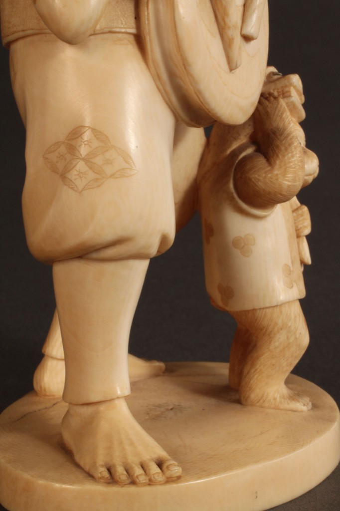 Lot 269: Asian Ivory figure, Musician with Monkey