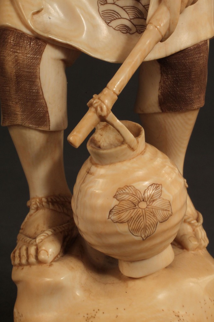 Lot 273: Asian Ivory figure, Peasant with wood basket & book