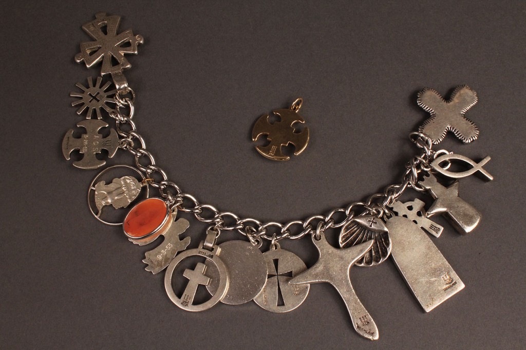 Lot 371: James Avery sterling charm bracelet & gold cross