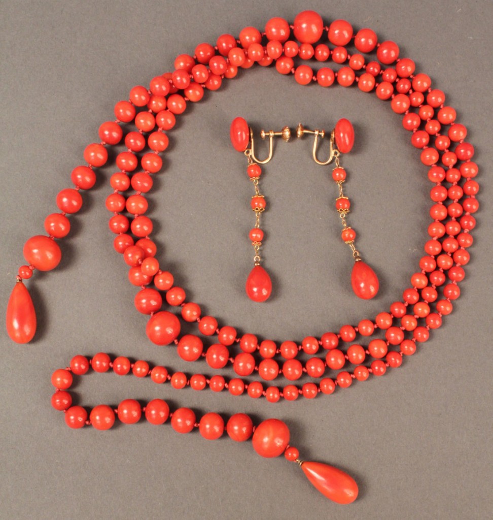 Lot 490: Red coral necklace, 54", and earrings