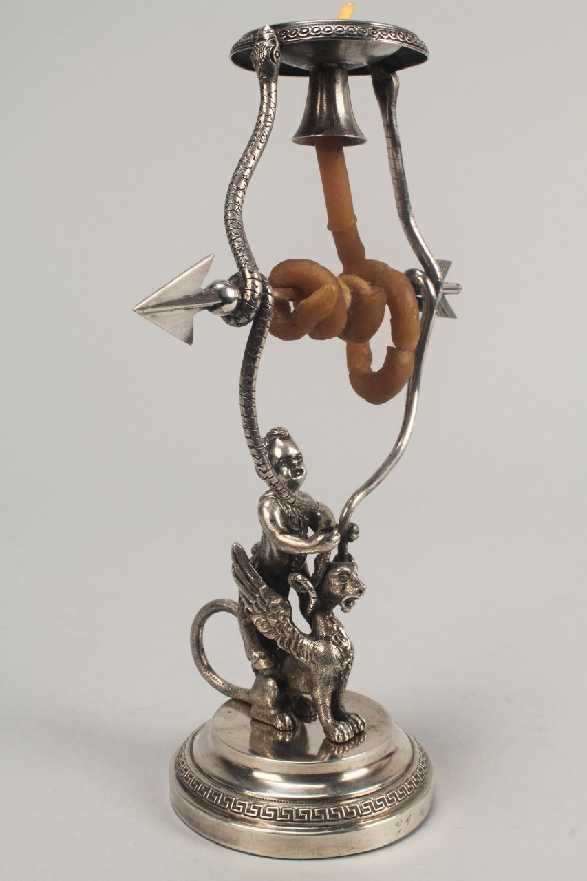 Lot 137: Figural silver wax jack candlestick w/ faun & grif