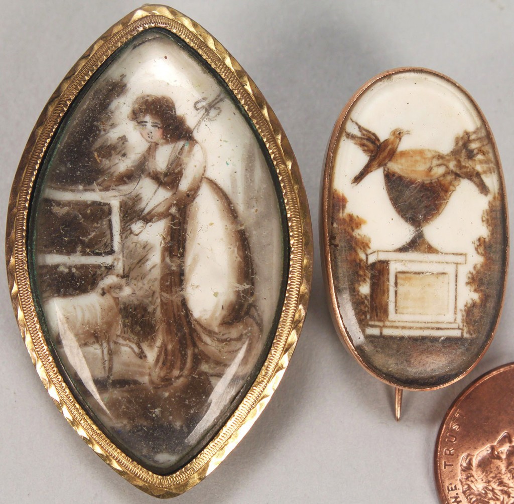 Lot 162: Two sepia miniature brooches, mourning scenes