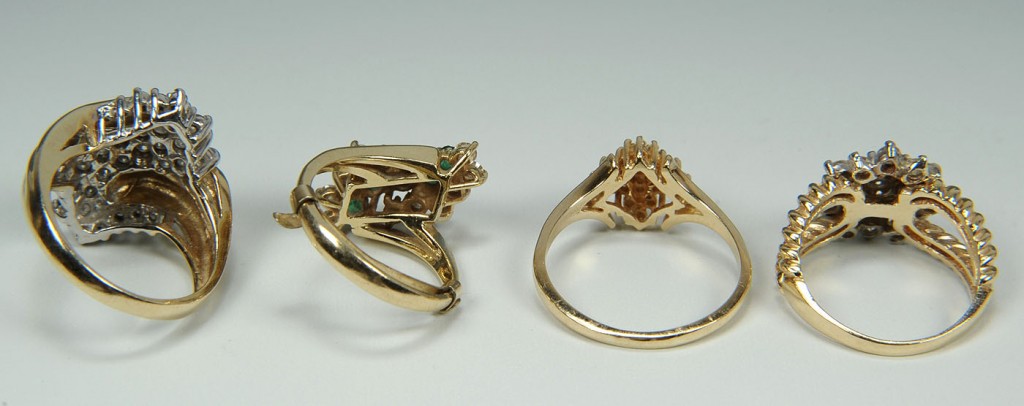 Lot 169: Four 14K yellow gold diamond cluster rings