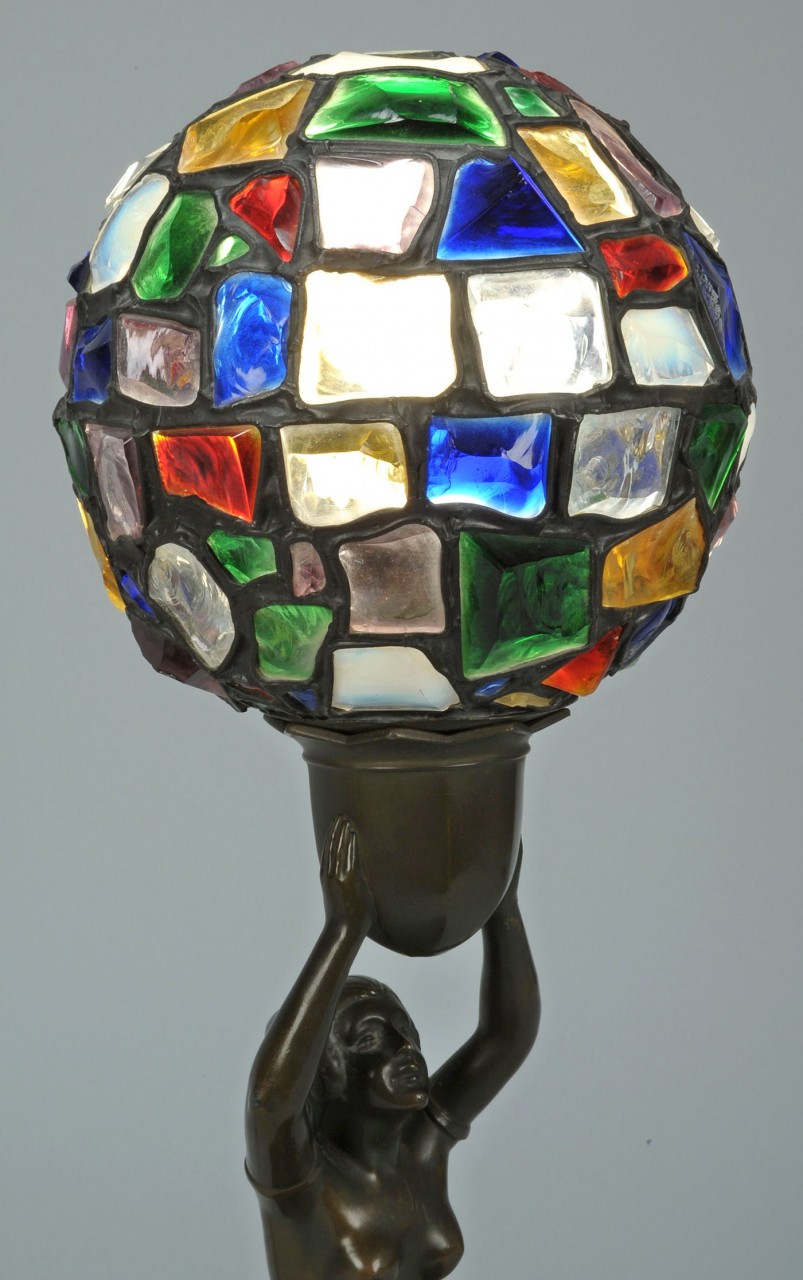 Lot 332: German Art Deco figure lamp, mosaic leaded shade