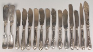 Lot 365: 15 coin & early sterling silver knives