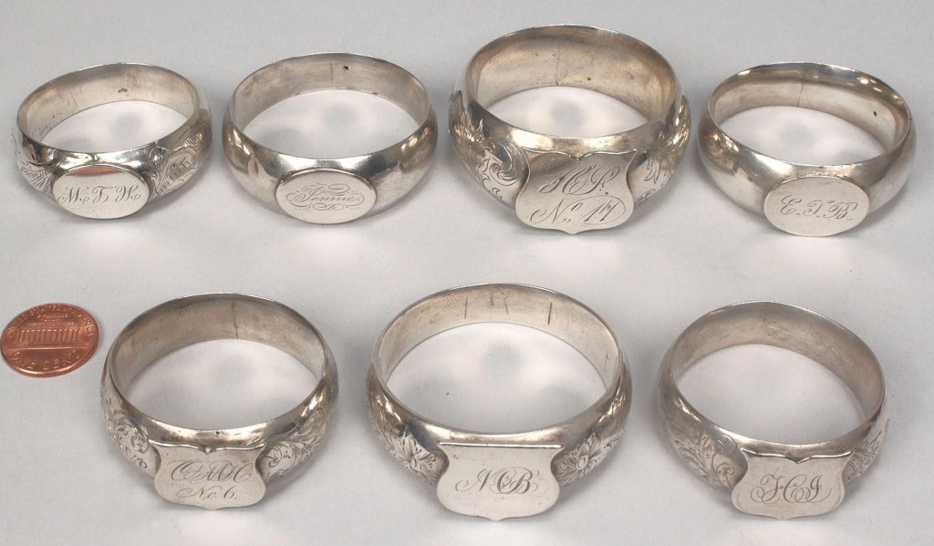 Lot 366: 7 Assorted coin silver napkin rings