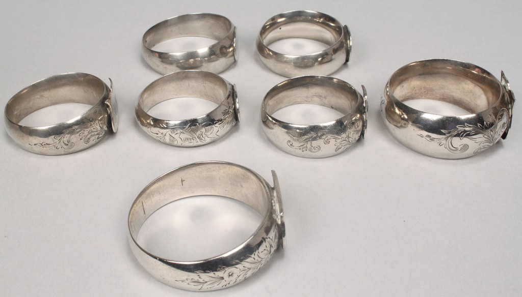 Lot 376: Collection of 7 napkin rings inc. Tiffany