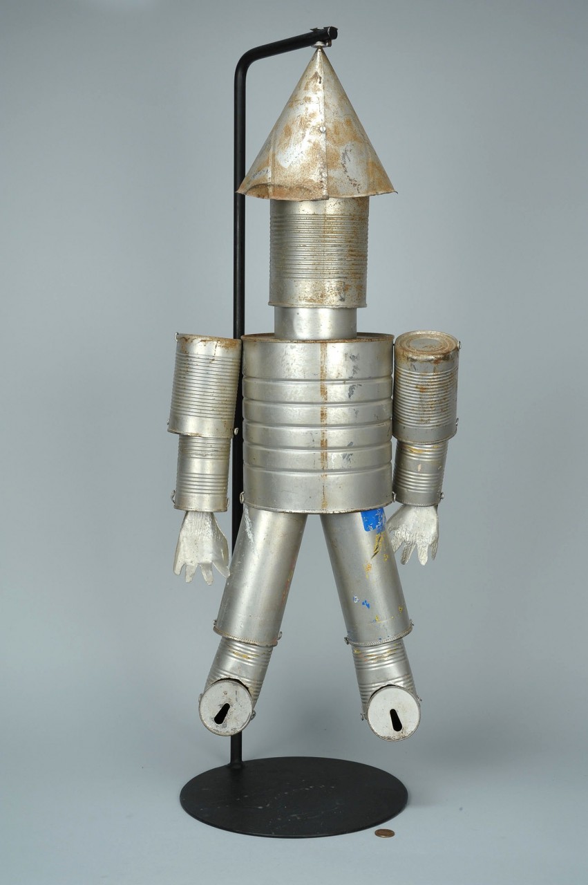 Lot 439: Folk art tin man or robot