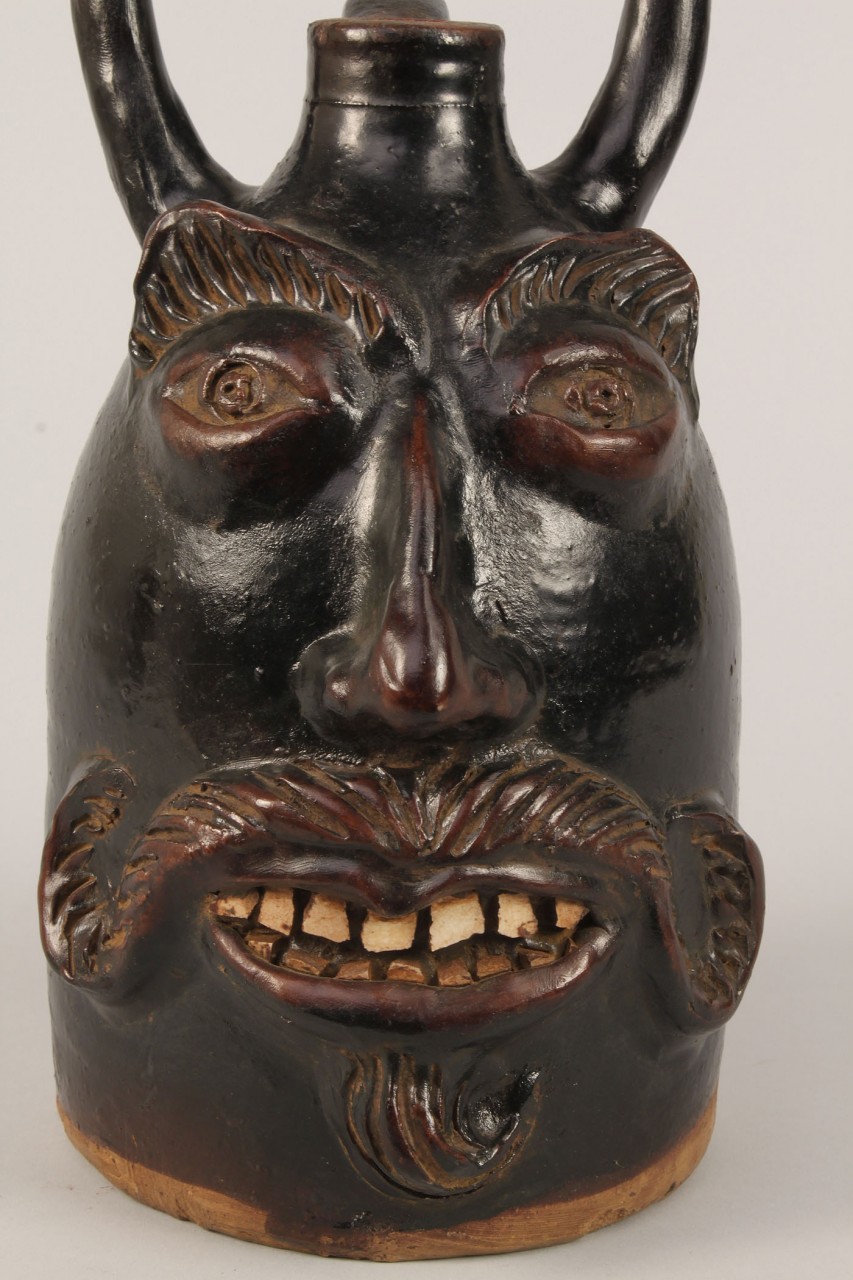 Lot 452: Southern Folk Pottery Devil Face Jug