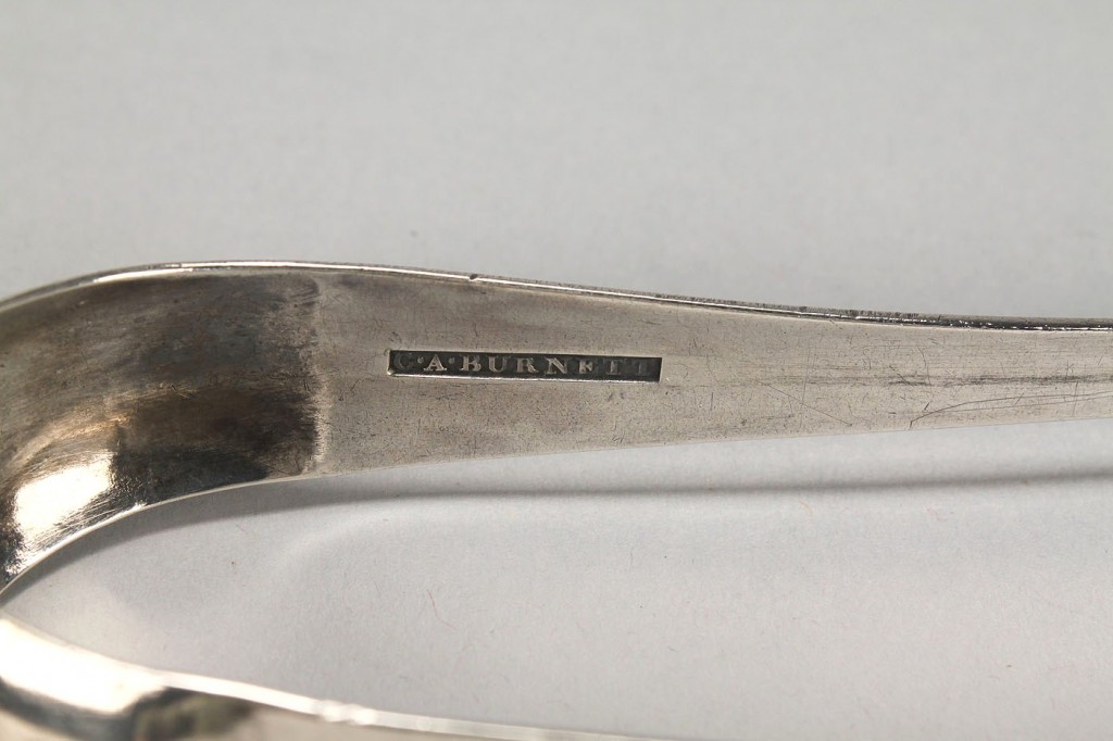 Lot 47: Coin silver tongs by C.A. Burnett of Alexandria, V