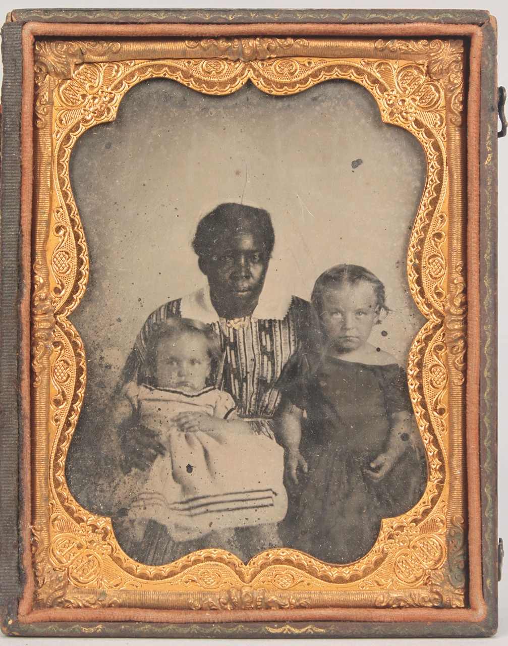 Lot 588: Cased Tintype of African American Mammy & Children