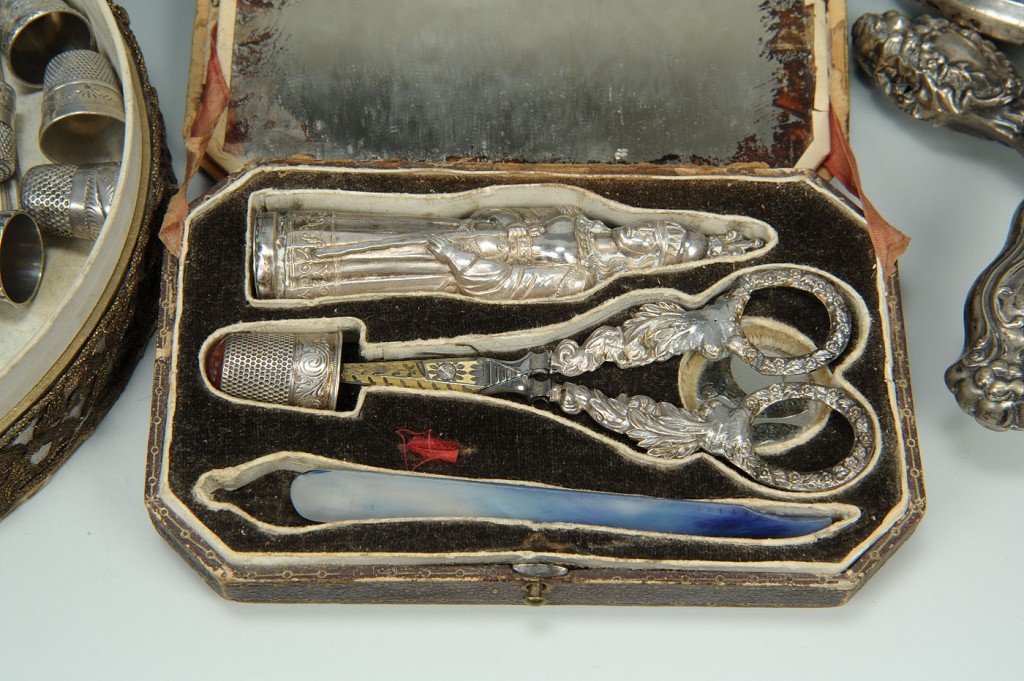Lot 606: Etui case and 30 assorted silver sewing notions