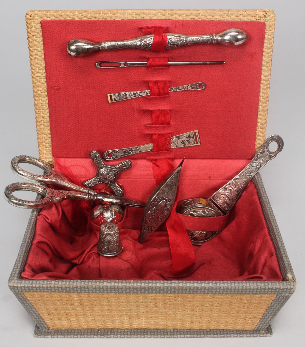 Lot 608: Box of antique sterling silver sewing accessories