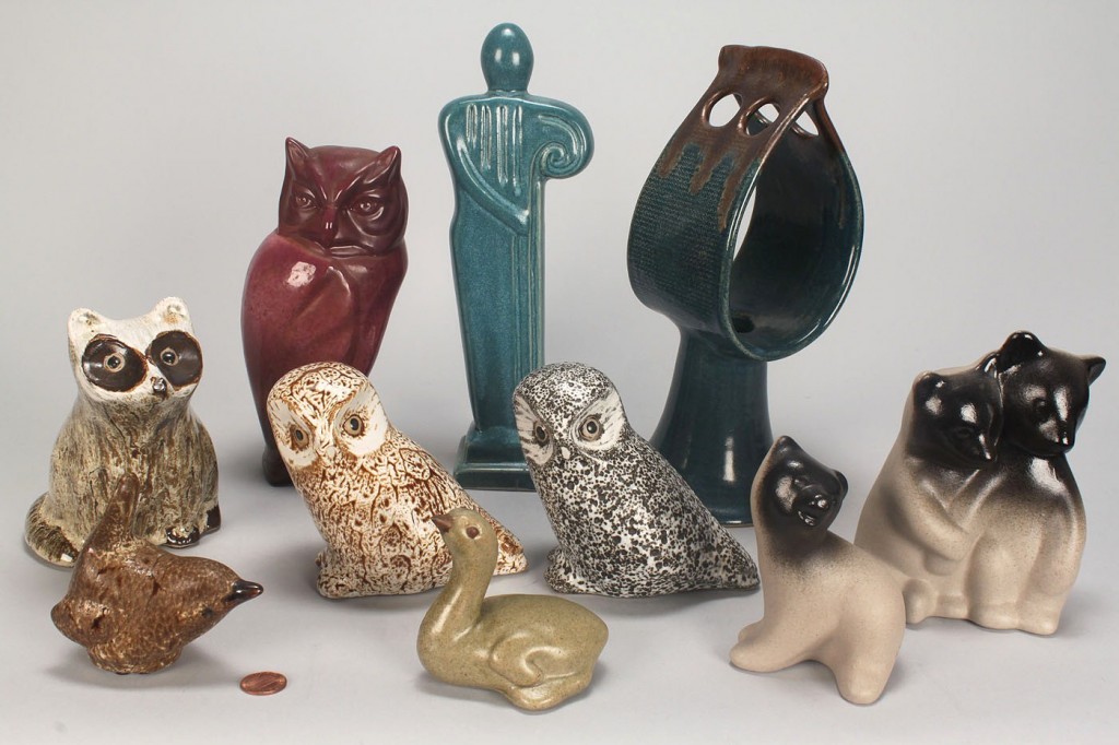 Lot 641: Group of Pigeon Forge Pottery figures, some signed
