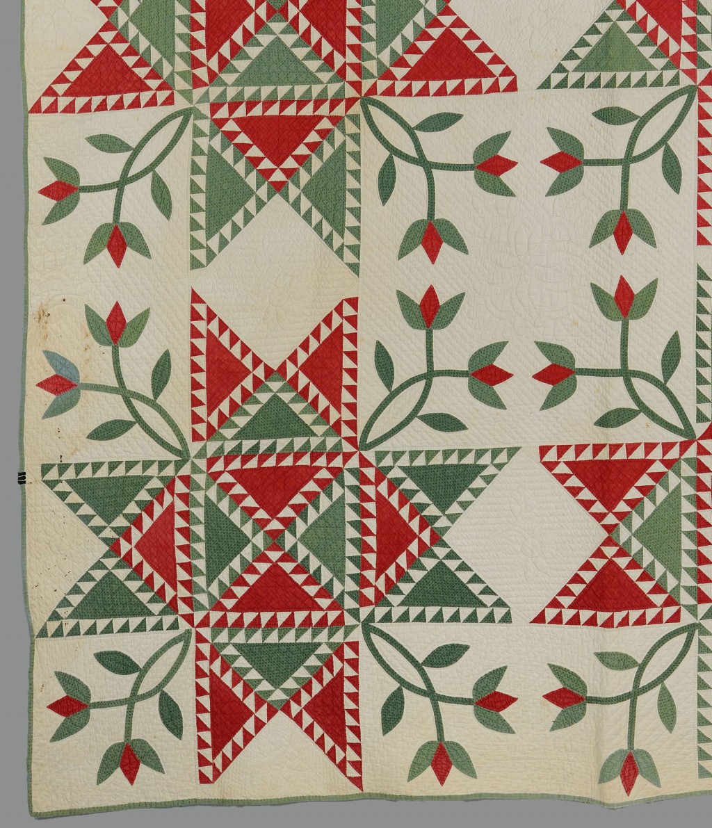 Lot 647: American cotton pieced and appliqued tulip quilt