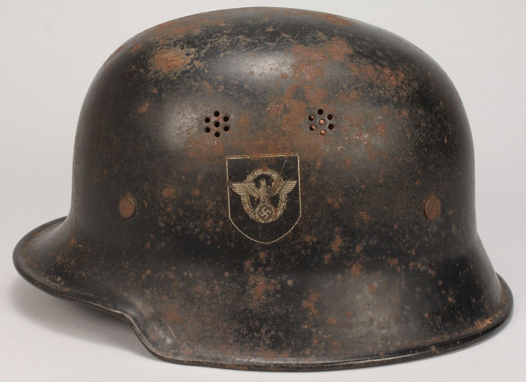 Lot 667: German WW II M34 Police/Fireman Helmet
