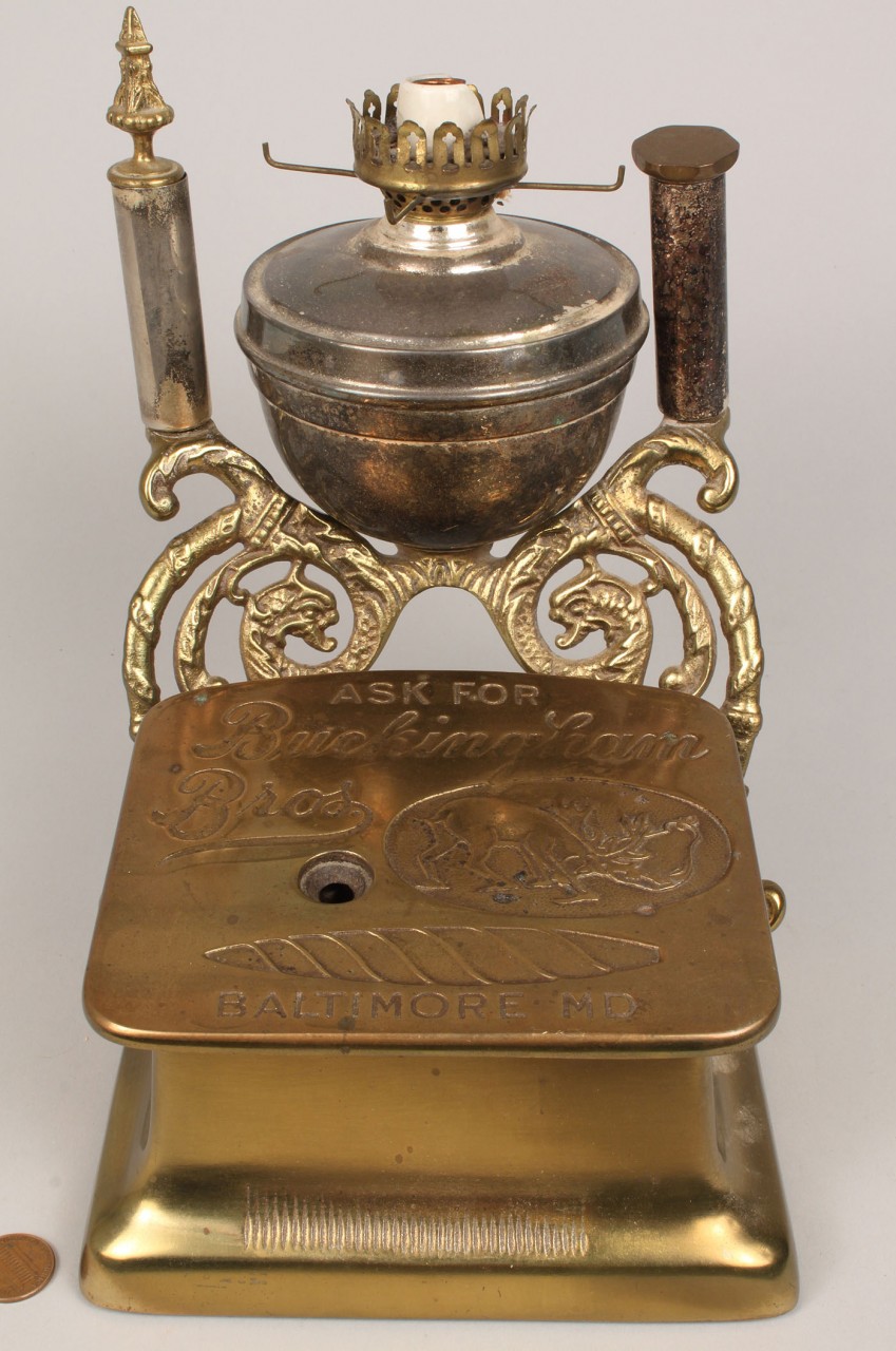 Lot 683: Brass Cigar Cutter lamp, Buckingham Brothers