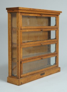 Lot 707: Country store oak counter top ribbon cabinet