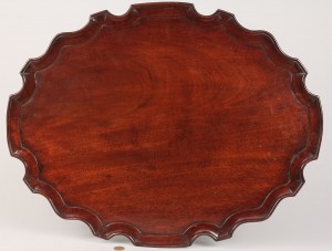 Lot 76: Chippendale mahogany pie crust tea tray