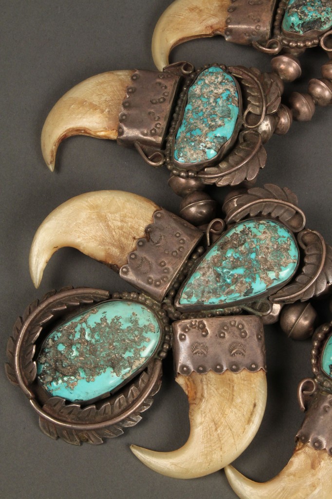 Lot 165: Native American silver and turquoise claw necklace