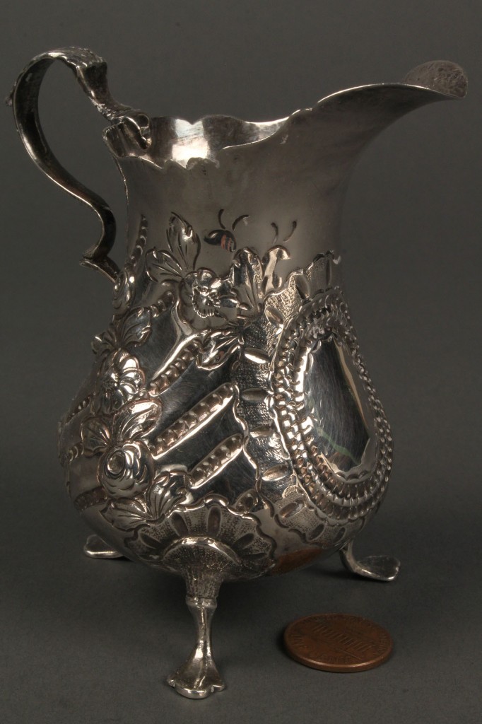 Lot 377: English Repousse Sterling Footed Creamer