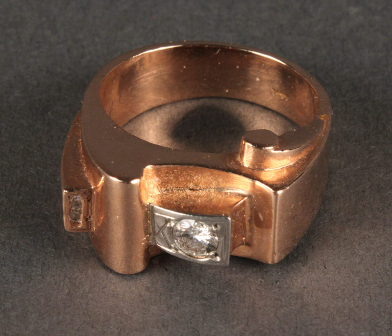 Lot 401: 14K gold and diamond ring