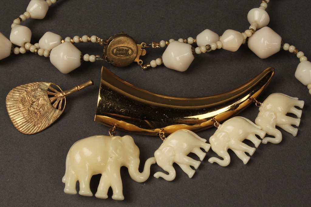Lot 408: Three Asian themed Miriam Haskell jewelry items