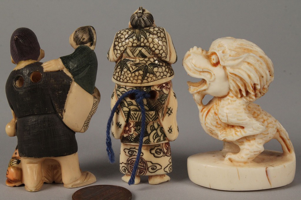 Lot 423: Three carved ivory Asian netsukes