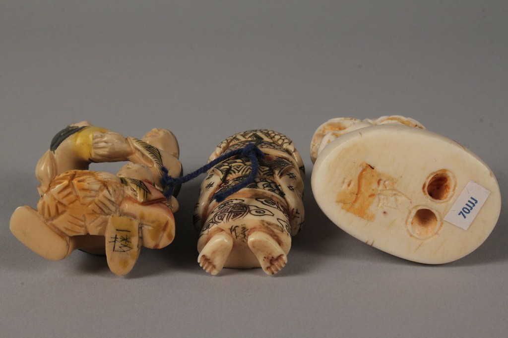 Lot 423: Three carved ivory Asian netsukes