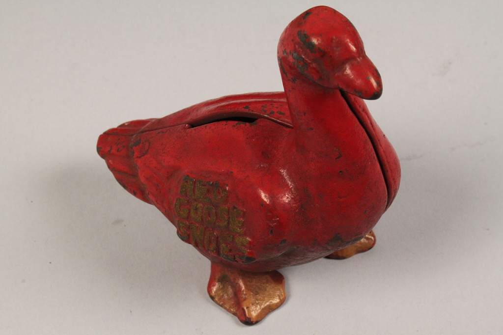 Lot 476: Red Goose Shoes Cast Iron Still Bank, Squatty form