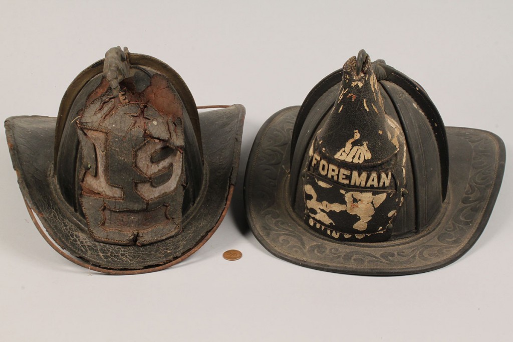 Lot 484: Lot of 4 19th century Fire Helmets