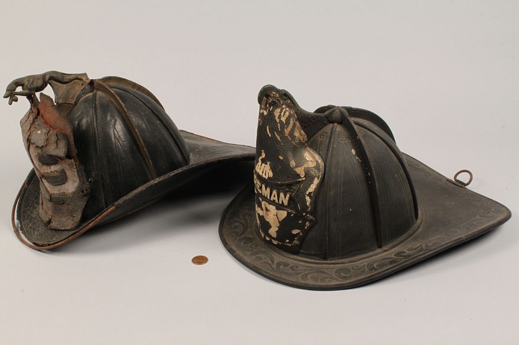 Lot 484: Lot of 4 19th century Fire Helmets