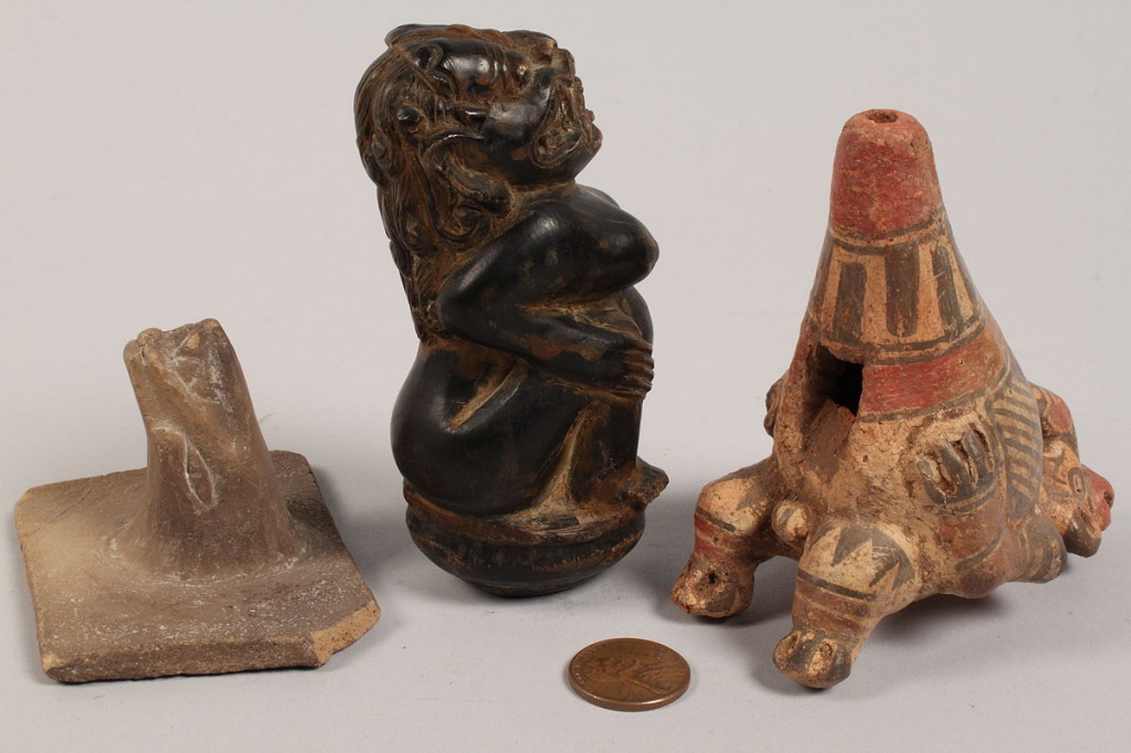 Lot 492: Lot of 3 ethnographic items: kris handle, stamp, whistle
