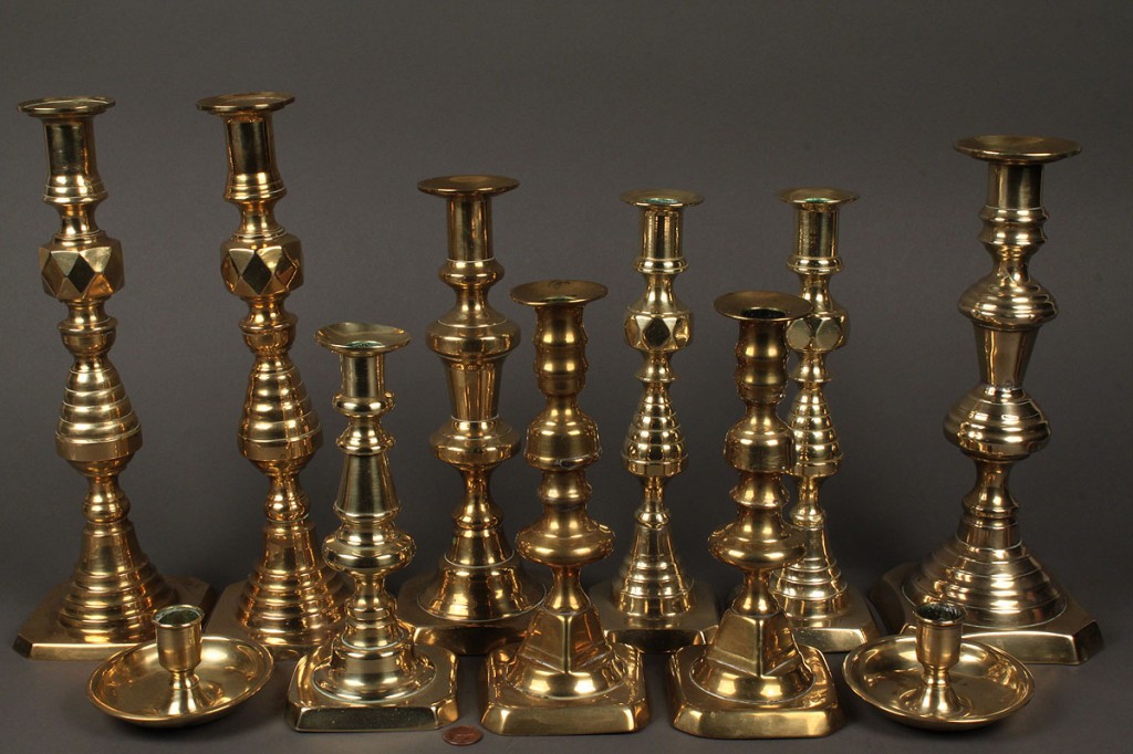 Lot 506: Lot of 11 early Brass Candlesticks