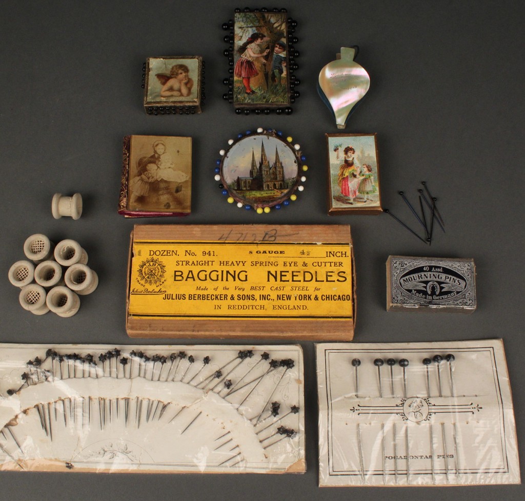 Lot 554: Collection of antique pin cushions, pins and reels