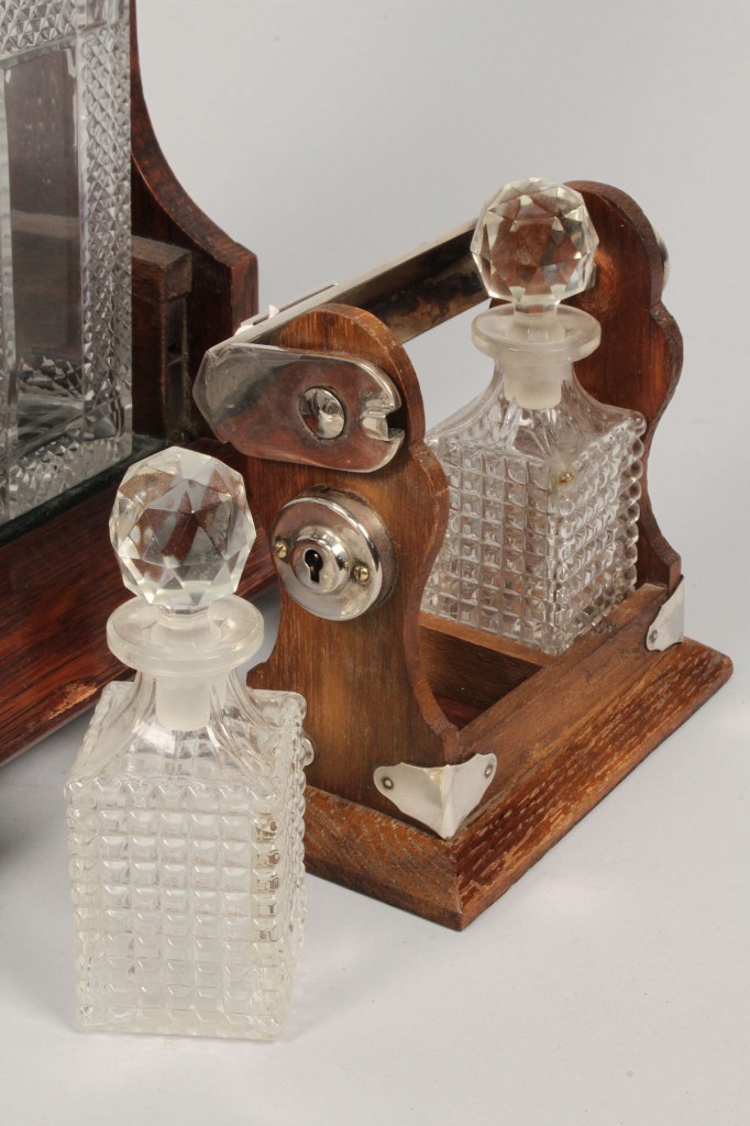 Lot 595:  2 Glass Tantalus Sets, one miniature