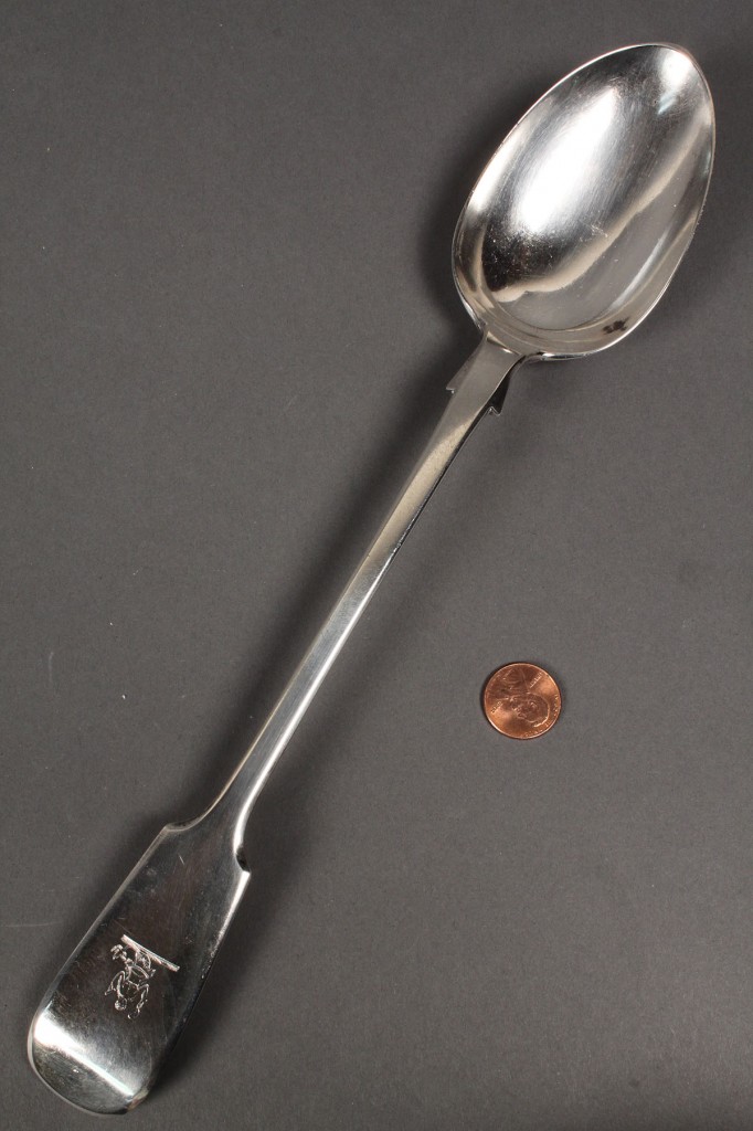 Lot 638: Sterling silver stuffing spoon