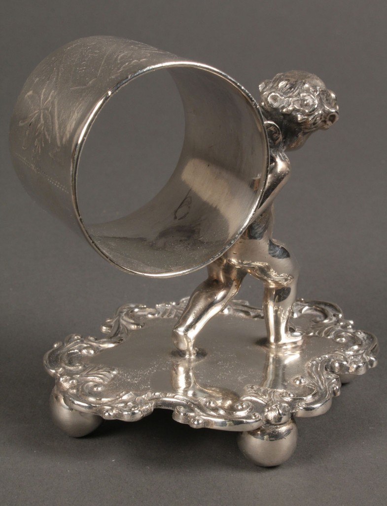 Lot 650: Victorian Silver Plated Cherub Figural Napkin Ring