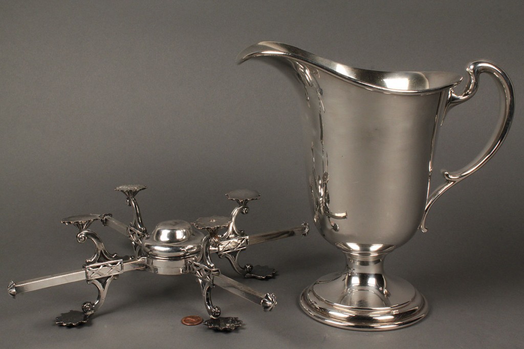 Lot 656: Silverplated dish cross and pitcher
