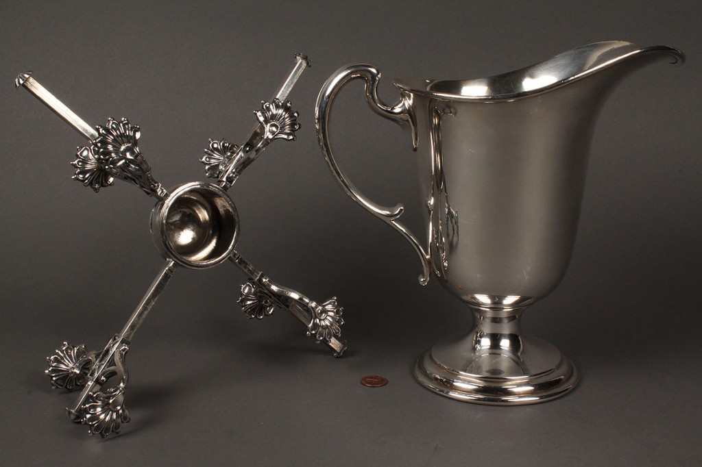 Lot 656: Silverplated dish cross and pitcher